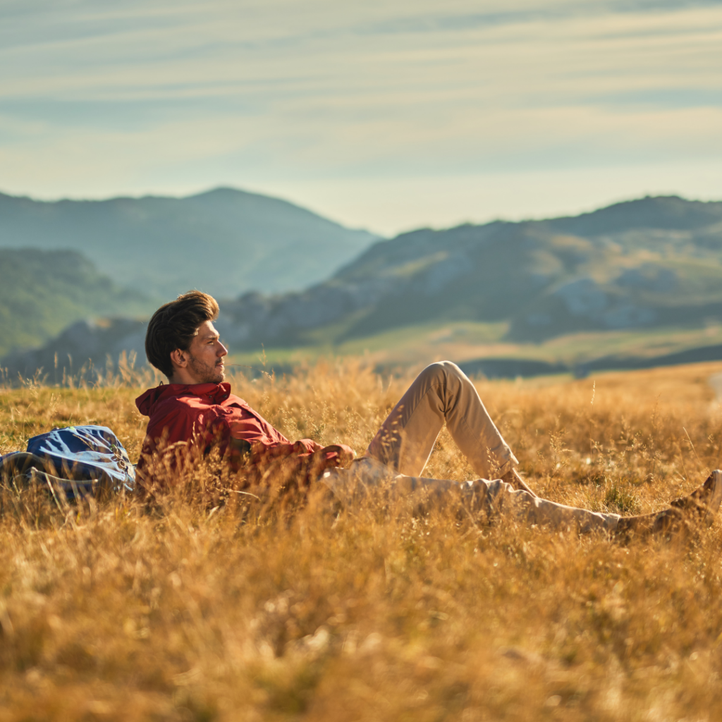 Man lying in a beautiful field